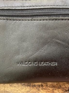 Wilson’s black leather wallet